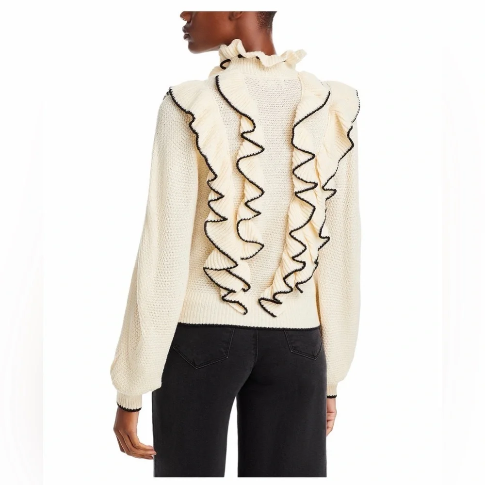 Stellah Ivory Sweater with Black Ruffle Accents